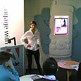 Anina demonstrating at the Adobe Flash booth
